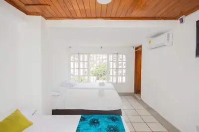 Image de Hermosa Habitacion Superior Multiple Para 5 Personas En El Rodadero