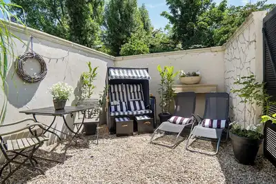 Image de Appartement 'Gästewohnung Am See - Maisonette' avec terrasse privée, jardin privé et Wi-Fi