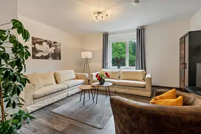 Image de Appartement 'Fewo Am Wald Erdgeschoss' avec terrasse partagée, jardin partagé et Wi-Fi