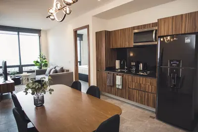 Image de Fully equipped kitchen, high speed internet, comfy king-size bed and a small sofa bed.