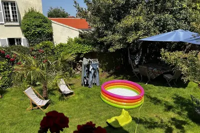 Image de Maison avec jardin en ville