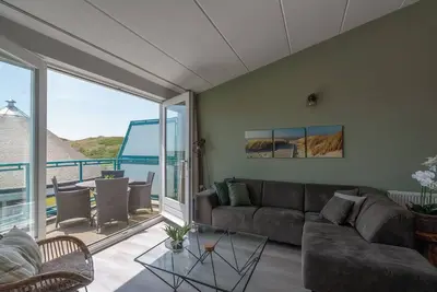 Image de Een Fantastisch Mooi Ingericht Appartement op Loopafstand van het Strand