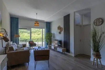 Image de Een Sfeervol Vakantie Appartement Gelegen op een Paar Meter van het Strand