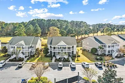 Image de Sunny condo with pools, tennis, balcony & lake/golf views - near the beach