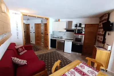 Image de Ausgezeichnete Wohnung auf den Pisten mit Terrasse