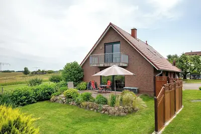 Image de Maison de vacances 'Großes Ferienhaus Mit Seeblick' avec vue sur le lac, terrasse privée et Wi-Fi