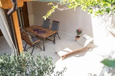 Image de Ferienwohnung direkt am Stand mit Terasse & Garten