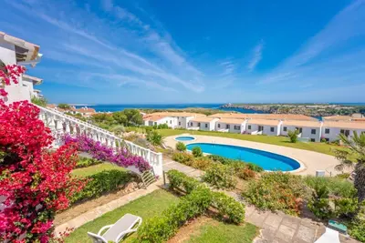 Image de Beach apartment with private garden and sea view, Menorca