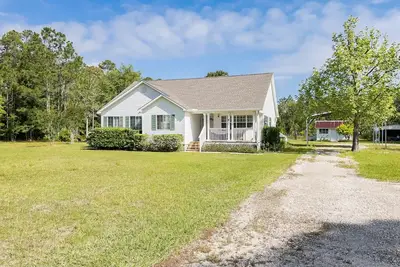 Image de Serene cottage on 3 acres w pond. 10mins to Perdido Key beaches- no hidden fees.
