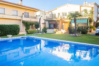 Image de Maison de vacances 'La Calma' avec piscine partagée, terrasse privée et Wi-Fi