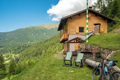 Image de Chalet \"Baita dei Minatori Val dei Mocheni\" avec vue sur les montagnes, terrasse privée et Wi-Fi