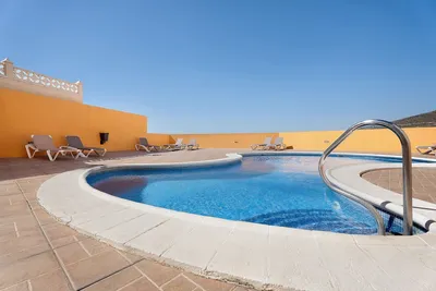 Appartement de vacances 'Roque Del Conde Sunset View' avec vue sur la mer, piscine partagée et Wi-Fi