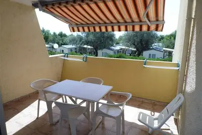 Image de Studio confortable avec terrasse, accès direct plage et parking privé