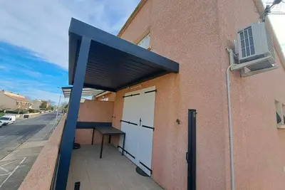 Image de Duplex climatisé avec terrasse, 6 couchages, cuisine équipée, barbecue et parking à Marseillan