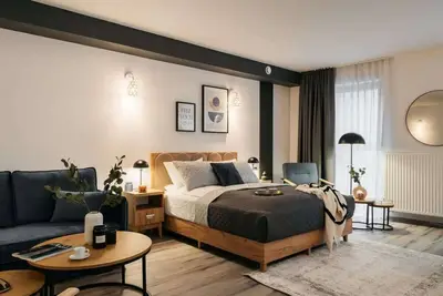 Orso Studio with king size bed and sofa