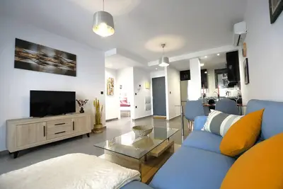 Image de Appartement de vacances \"Oasis Beach 129\" avec piscine partagée, terrasses privées et Wi-Fi
