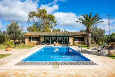 Image de Maison de campagne 'La Paloma De Sa Torre Marina' avec piscine et climatisation