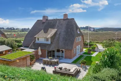 Image de Herzlich Willkommen im Ferienhaus Beach House