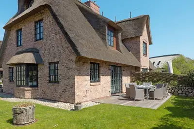 Image de Herzlich Willkommen im Ferienhaus Lister Reet Lodge