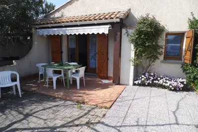 Image de Maison mitoyenne 3 pièces avec terrasse, jardin clôturé et parking - 6 couchages à Marseillan