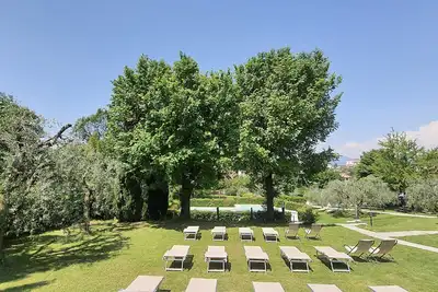 Image de Villa Santa Caterina - Appartement dans villa avec grand parc et piscine