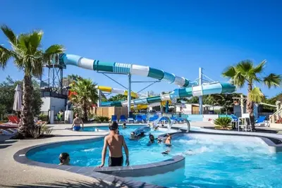 Image de ZEcamping 4* à 3km de la plage club enfant piscine couverte animations