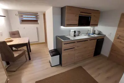 Image de Economy apartment basement (22sqm) with kitchen, smart Tv and rain shower