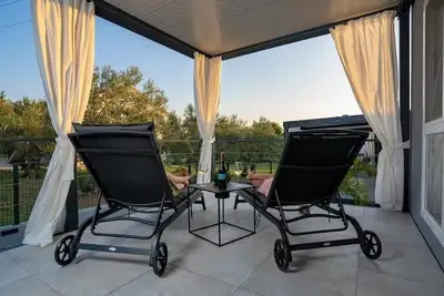 Image de Appartement de deux chambres avec la terrasse et la vue sur le mer Sveti Filip i Jakov, Biograd (A-18632-b)