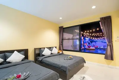 Image de 5 minutes to beach. Family 4- bedroom Pool Villa Jomtien Beach. Pattaya