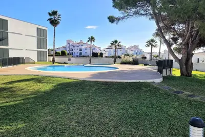 Image de Appartamento con Piscina