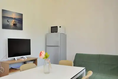 Image de Appartement moderne avec terrasse pour 5 personnes - Beahost