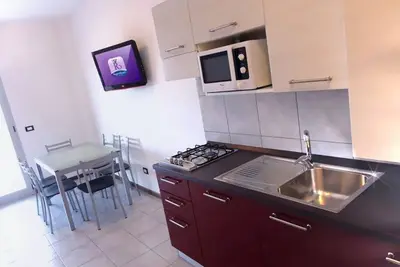 Image de Confort au bord de la piscine - Beahost Rentals
