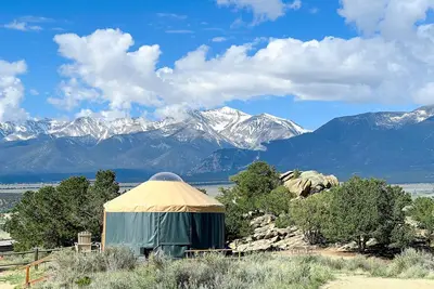 Image de The Yurt is our newest lodging option and a guest favorite! The Yurt sleeps 1-4 with a queen bed and double sleeper sofa. A/C and heat for a comfortable year-round stay.