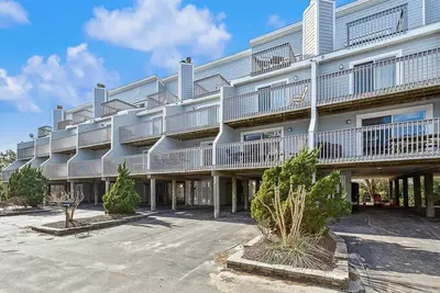 Image de Activities included up to $300 Free Per Week! ! New Listing 2024! Beautifully decorated vacation townhome in North Bethany approximately 300 feet from the beach and nestled behind the dunes with a private boardwalk taking you out to the surf and sand!