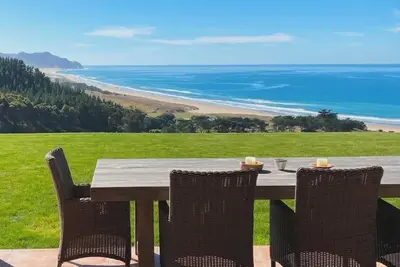 Image de Mediterranean-inspired beach home, surrounded by the Ocean