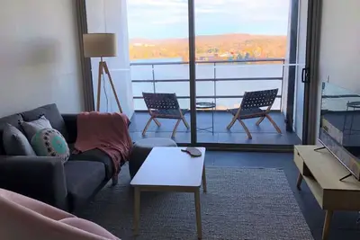 New to Vrbo: Lake view city apartment with free parking!