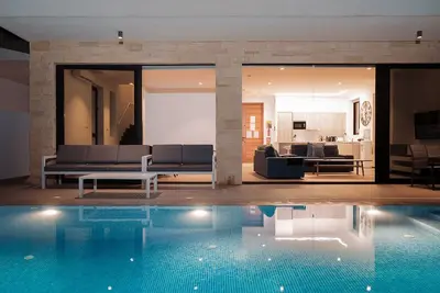Image de Villa Ektoras at Periyiali Resort with modern design, and amenities.