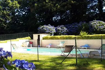 Image de Homerez - Maison charmante à Langoëlan avec piscine partagée