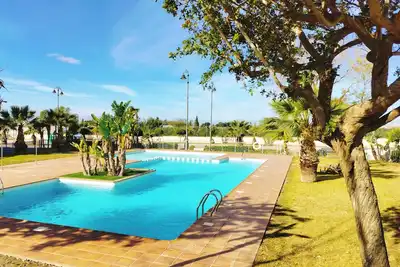 Sunny, Cosy Apartment with Balcony and Swimming Pool & Golf Course Views