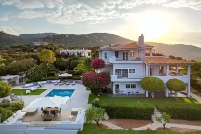 Beach front villa with private sea water pool & amazing sea view to Saronic golf