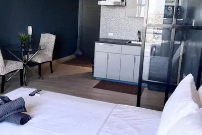 Image de Cozy 1-bedroom condo in welcoming Makati with WiFi, Ac, fitness room
