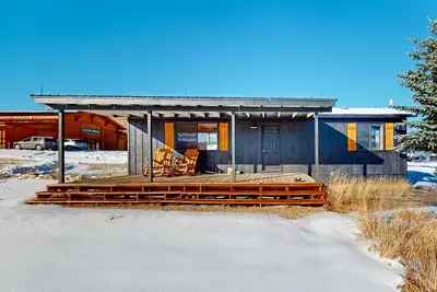 Image de Mountain-view retreat on 1, 800-acre ranch with animals, firepit, games, & deck