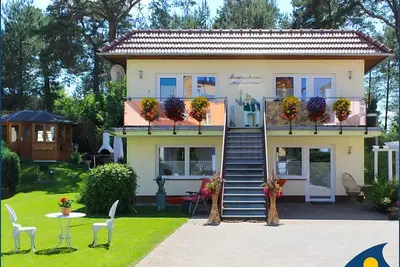 Image de Haus KieferndĂĽne Ferienwohnung Eg - + Ferienwohnung Eg