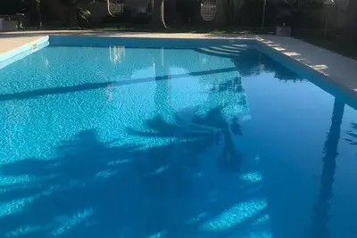 Entire Apartment in Villa with Pool facing the Beach