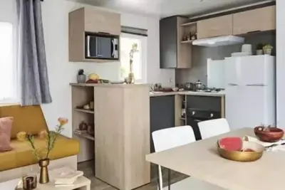 Image de Mobil Home Premium - 32m2 - Klimaanlage - 2 Schlafzimmer - überdachte Terrasse - 4 bis 5 Personen - 4 Pers. im Preis enthalten