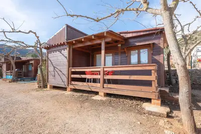 Image de Maison de vacances 'Cabaña Madera A' avec vue sur les montagnes, Wi-Fi et climatisation