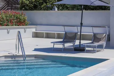 Image de Bel appartement pour 4 personnes avec climatisation, piscine, Wifi, Tv, terrasse et parking