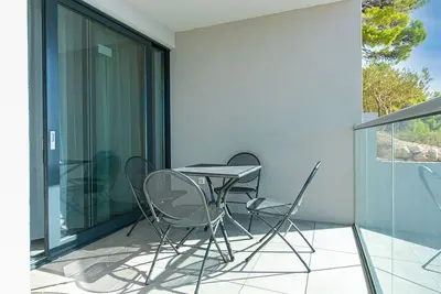 Image de Appartement de deux chambres avec la terrasse et la vue sur le mer Brela, Makarska (A-20229-a)