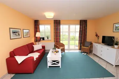 Image de Ferienwohnung mit Terrasse Direkt Hinter der DĂĽne