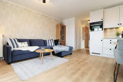 Image de Ferienwohnung Direkt Hinter der DĂĽne mit Kostenloser Sauna-/schwimmbad Nutzung